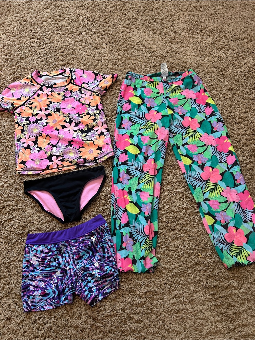 Assorted girls bundle of swimwear and gymnastics shorts